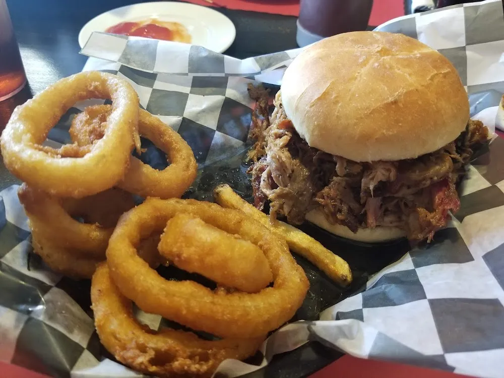 Pulled Pork Sandwich and a Side of Onion Rings